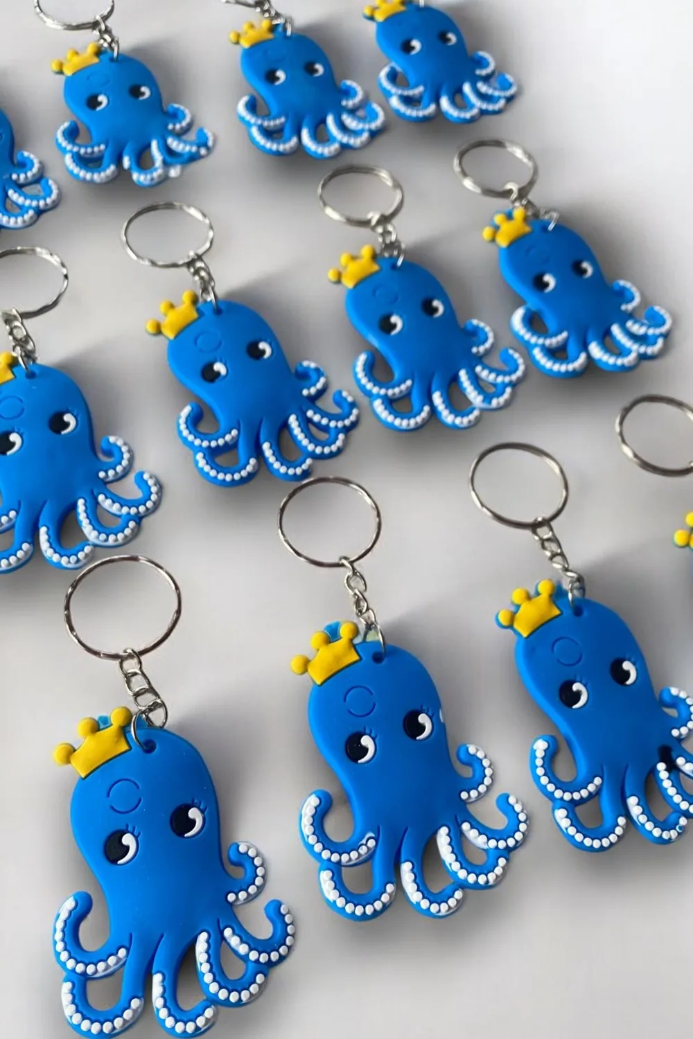 طقم 12 ميدالية مفاتيح زرقاء بشكل أخطبوط - صورة 3