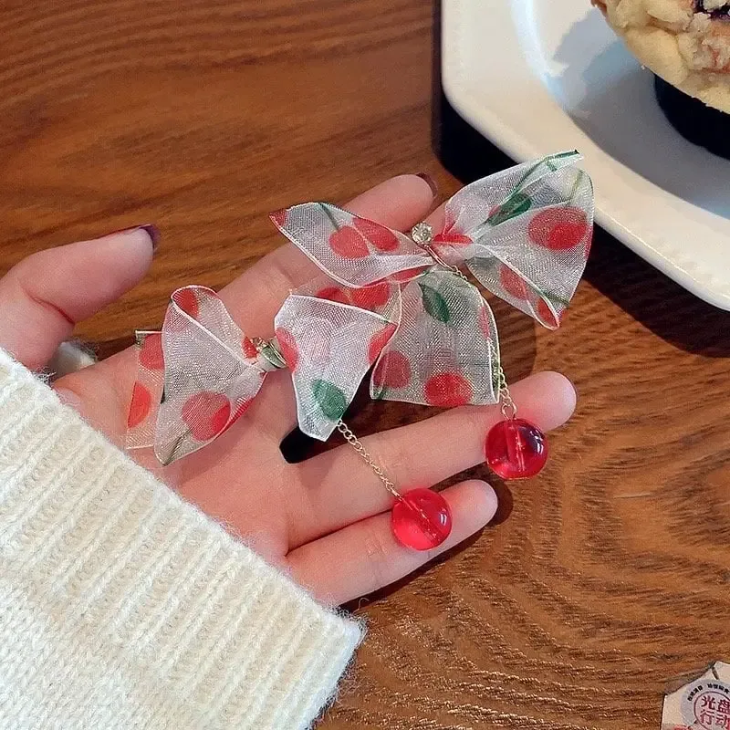 أقراط متدلية بفيونكات الكرز وخرز أحمر - صورة 3