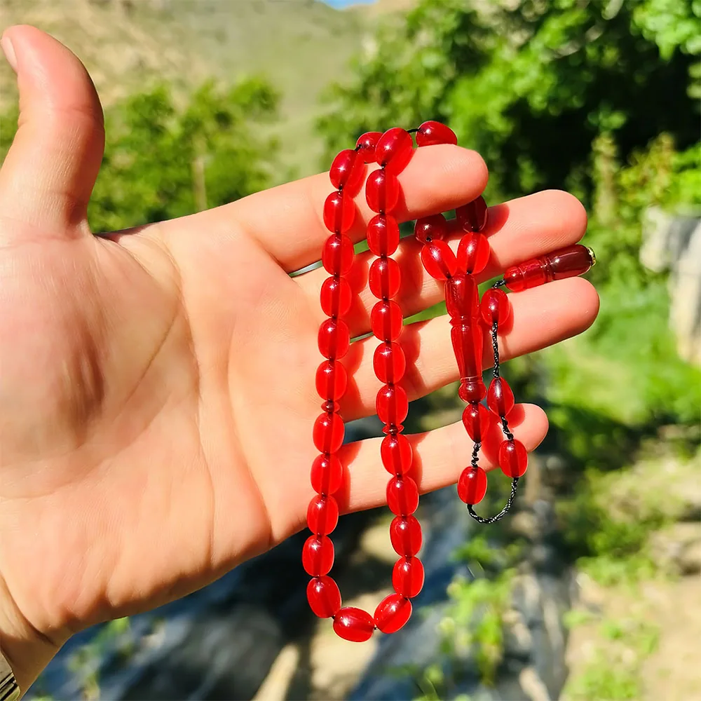 مسبحة كهرمان مضغوط حمراء شفافة