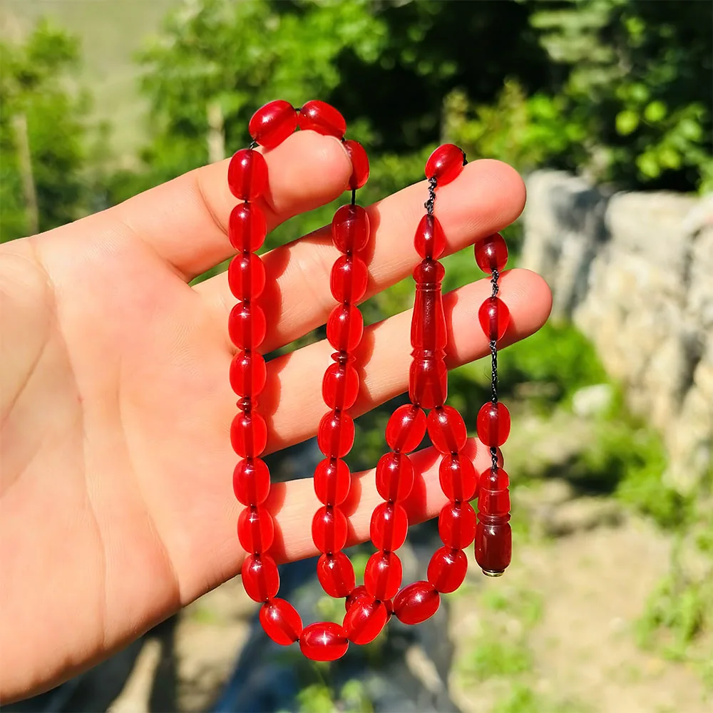 مسبحة كهرمان مضغوط حمراء شفافة - صورة 2